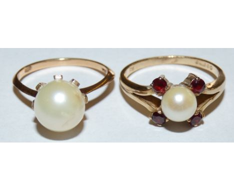 A 9ct gold cultured pearl and garnet dress ring and a 9ct gold cultured pearl ring (2)