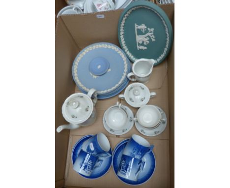 A box of blue and white together with Wedgwood Christmas plates, Royal Copenhagen Christmas cups and saucers and a German tea