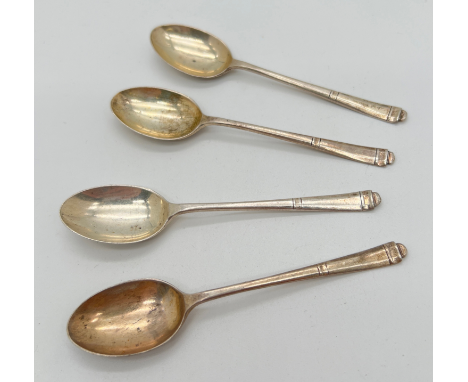 4 vintage silver coffee spoons with Art Deco style design to finial ends. Hallmarked Sheffield 1948. Total weight approx. 29.