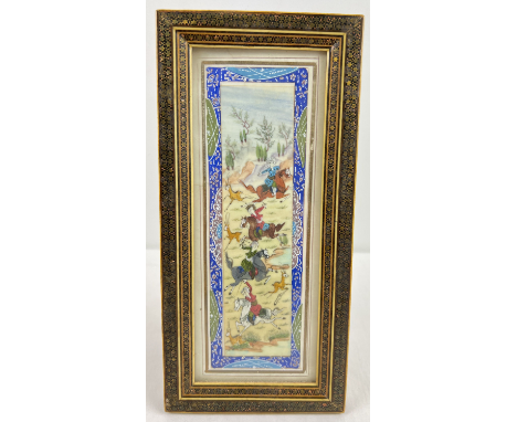 A Persian hand painted thin rectangular panel depicting a hunting scene, in decorative inlaid frame and handpainted mount. Fr