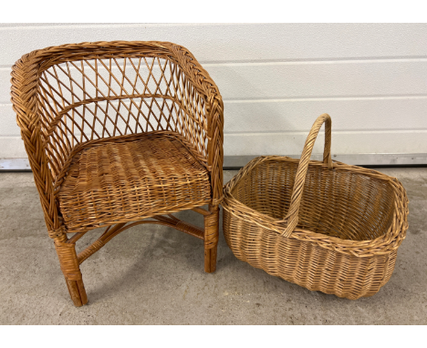 A small child's wicker chair together with a vintage wicker shopping basket. 