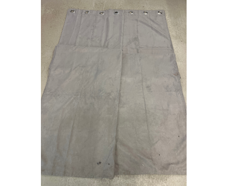 A pair of grey faux suede long eyelet curtains. Approx. 57 x x 98 inches each (145 x 250cm). Some staining to bottom of one c