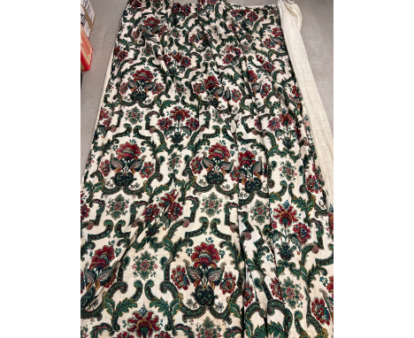 A pair of bespoke made heavy linen curtains with a green and red floral design. Both with fleece type lining and blackout mat
