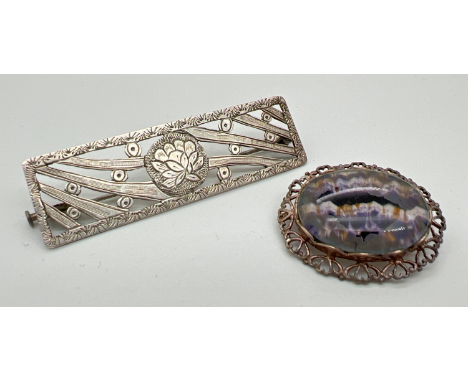 2 vintage silver brooches. An oval brooch with heart design pierced work mount set with Blue John, together with a rectangula