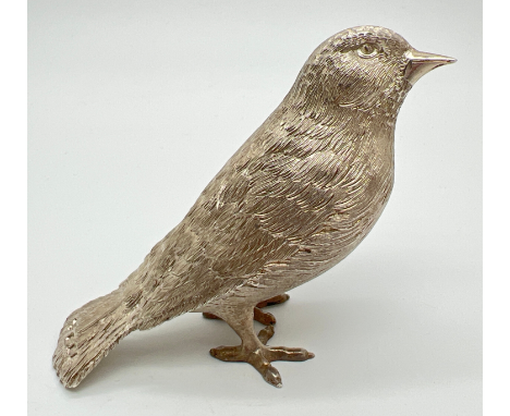 A vintage cast silver model of a song bird, hallmarked for Garrard &amp; Co, London 1979. Approx. 7cm tall and weighs approx.