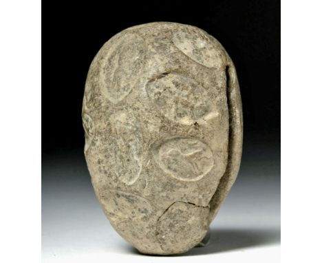 Sumer, modern-day Iraq, ca. 4th to 3rd millennium BCE. An egg-shaped grey terracotta envelope, hollow on the interior, and st