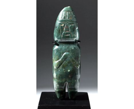 Pre-Columbian, Costa Rica, Olmecoid, ca. 500 to 1000 CE. A striking anthropomorphic axe figure, carved from a beautiful deep 