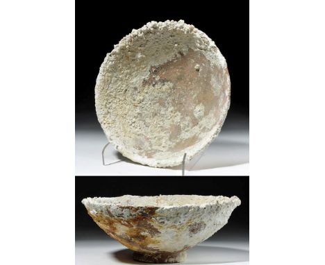 Roman, Imperial Period, eastern Mediterranean, ca. 1st to 3rd century CE. A rounded bowl with a disc foot and slightly turned