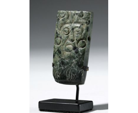 Pre-Columbian, Mayan Territories, ca. 600 to 950 CE. A striking example of Mayan artistry carved from a roughly rectangular m