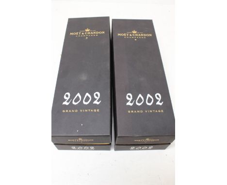 Two Bottles Of Moet & Chandon Champagne 2002 Grand Vintage In Boxes Both Boxes Are In Good Overall Condition, Both Bottles Ar