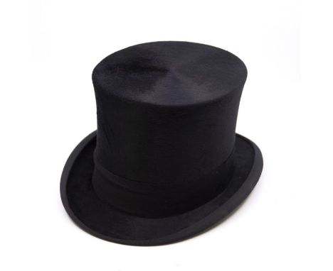 A vintage James Lock & Son silk top hat, interior measurements 21 x 17cm together with leather silk lined hat box and cover (