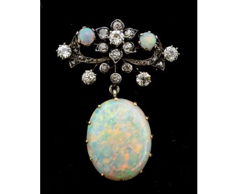 A Belle Époque opal and diamond gold and silver brooch, comprising a decorative floral diamond set top, floral cluster to the