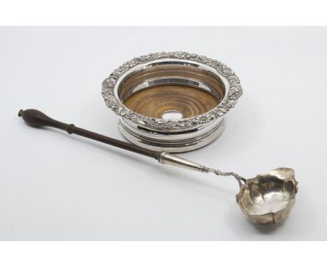 A George II silver toddy ladle, scalloped bowl with turned wooden handle, initials to underside, hallmarked London, 1747, mak