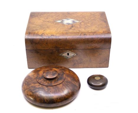 A 19th century rosewood circular snuff box, hinged cover inset with chased brass roundel, approx 7cm diam; a 19th century bur