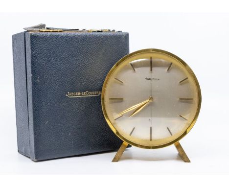 Jaeger-LeCoultre- a mid-20th century brass clock, circular silvered dial applied gilt baton indicators, dial approx 11.5cm, r