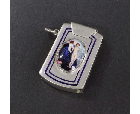 Attractive white metal vesta case fitted with an oval enamel of a female nude framed by blue enamel borders, fitted with a st