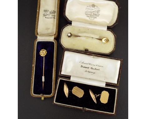 Pair of 9ct engine turned cufflinks, 3.9gm, boxed; together with three gold stickpins with two boxes