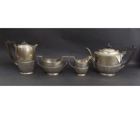 Georgian style four piece half fluted silver tea service, maker Robert Pringle & Sons, London 1922, the teapot 11" long, 45oz