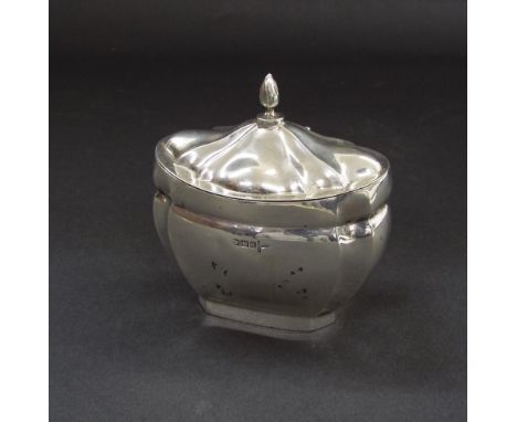 Late Victorian silver lobed serpentine tea caddy, mounted by a flambeau finial, maker Walker & Hall, Sheffield 1898, 4" high,