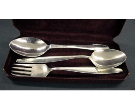 Attractive Georg Jensen Danish silver boxed christening fork and spoon, the box 6.25" long; together with a further Georg Jen