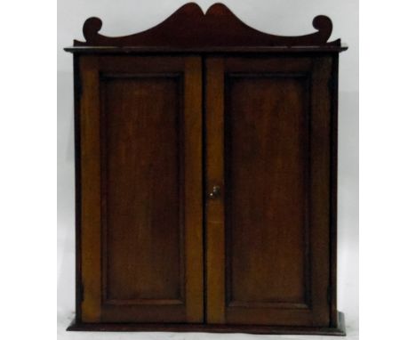 Late 19th century miniature mahogany cabinet, with shaped pediment, the pair of panel doors enclosing shelf, width 47cm 