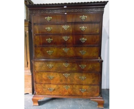 Georgian mahogany chest on chest, with gadrooned pediment and Greek key pattern, blind fretwork cornice, two short and three 