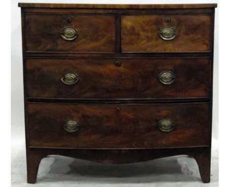 Georgian mahogany bowfront chest of drawers with two short and two long graduated drawers, with oval brass plate handles, rai