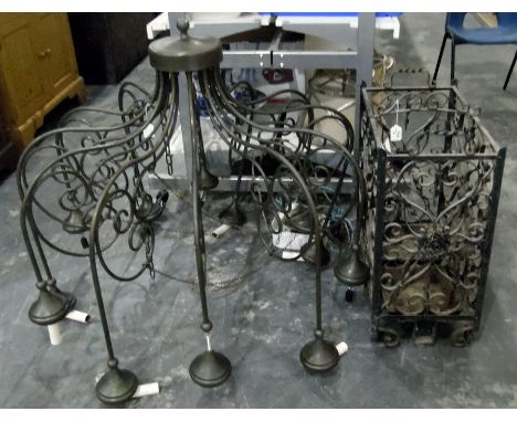 Large wrought iron hanging lamp divided into 12 separate sconces, adapted for electricity, a cast iron umbrella stand with dr