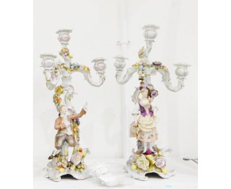 Pair of Plaue porcelain candelabra, each four-light with three scrolls, all with ornate foliate drip tray, floral encrusted, 