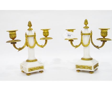Pair of 19th century ormolu-mounted white marble candelabra, each with ormolu pineapple finial to the fluted column, two-bran