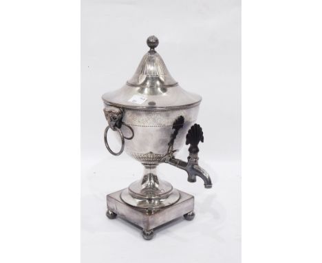 Late Georgian neo-classical style pedestal urn with pointed lid with spherical finial, pair of ram's mask and ring side handl