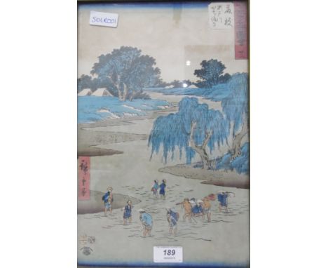 20th century Japanese woodblock print depicting figures crossing a river, monogrammed, 33cm x 21.5cm 