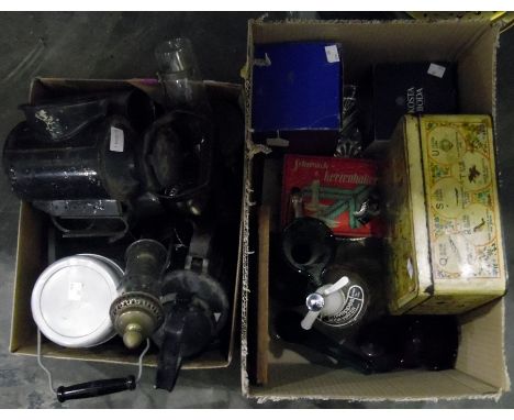 Quantity of metal paraffin lamps, a large vintage thermos flask, a quantity of vintage tins, a Schwepps soda water syphon, Ar