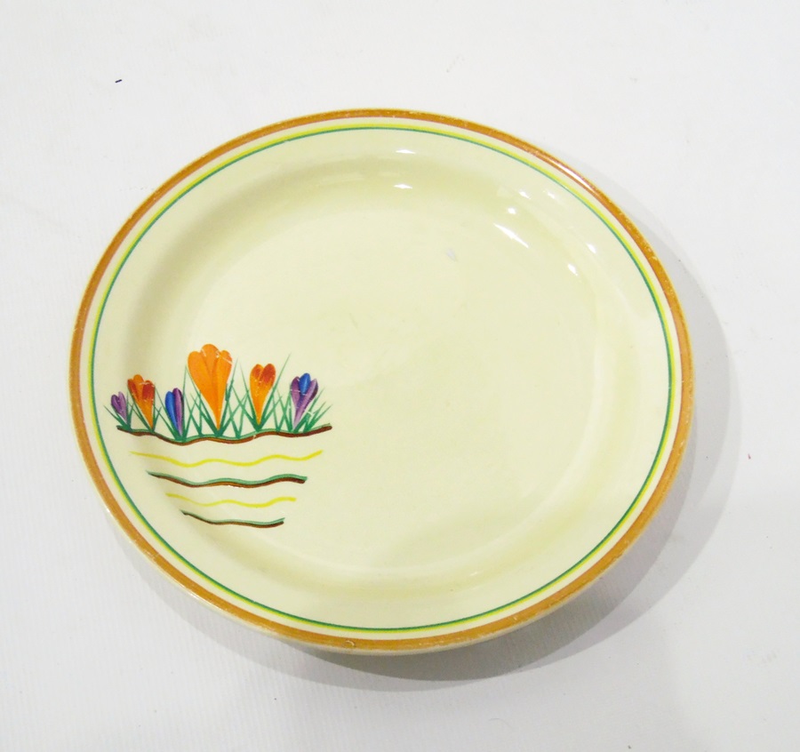 Clarice Cliff 'Bizarre' pattern dish, a stoneware jug, a 