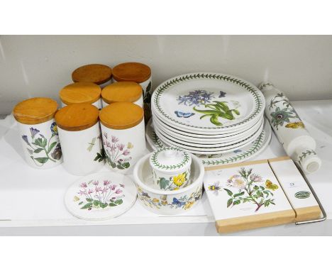Eight Portmeirion 'The Botanic Garden' pattern meat plates, seven storage jars, cheese slicer, rolling pin and four other ite