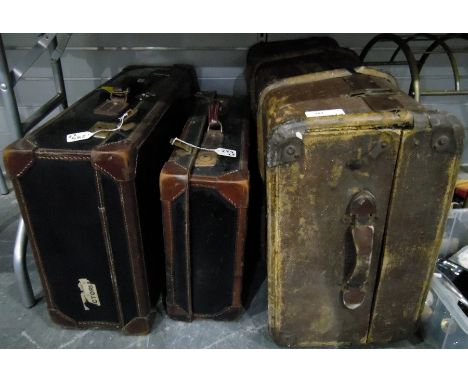 Two vintage leather suitcases, graduated and a canvas and wood bound trunk (3)