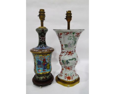 Oriental brass-mounted porcelain table lamp, baluster-shaped and panel decorated with reserves of figures in landscapes, on f