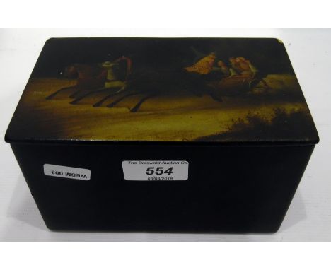 Late 19th century Russian black lacquered tea caddy of rectangular form, the hinged cover painted with a scene depicting a fa