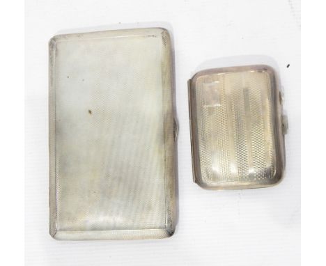 Mid 20th century silver cigarette case of rectangular form, engine turned, gilt interior, Birmingham 1941, another smaller 19