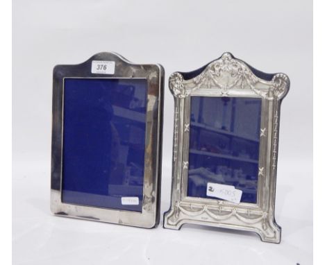 Modern silver-mounted photograph frame with arch and scroll top, husk swag and reed and ribband borders, bracket feet, 13cm x