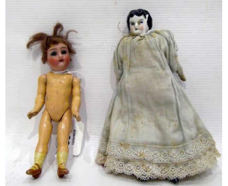 Two miniature dolls, one with bisque head, opening eyes and composite body and the other with ceramic head 