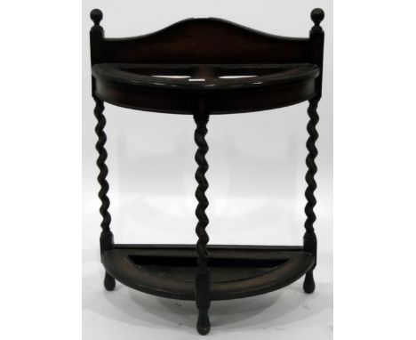 Early 20th century and demi-lune oak stick umbrella stand on spiral turned supports and with metal drip tray, 57cm wide 