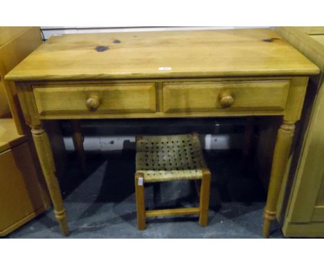 Pine side table with two frieze drawers, on turned supports, 91.5cm wide and a wicker and pine stool (2) 