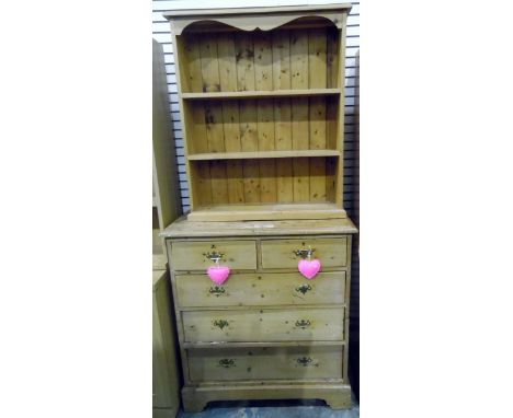 Pine chest of two short and three long drawers, on bracket feet, with brass handles, 91cm wide and a modern pine three-tier b
