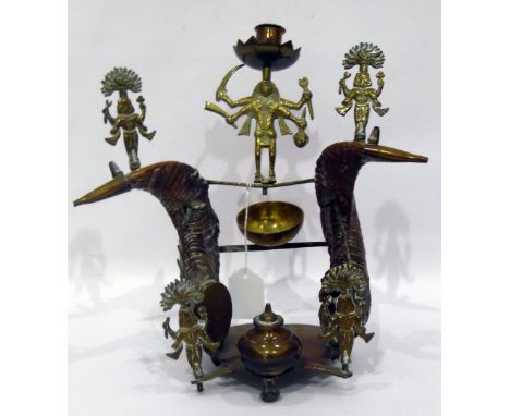 Late 19th/early 20th century Indian brass and horn desk stand surmounted with central deity supporting candle sconce above bo