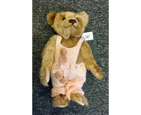 Steiff bear in pink dungarees, with tag to ear 