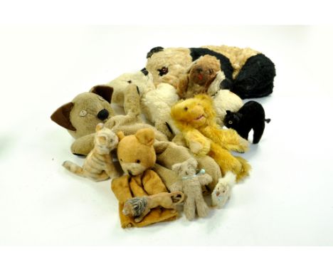 A group of Plush, vintage toys, including Heyde? Lion and various PJ Cases, some others.  Enhanced Condition Reports: We are 