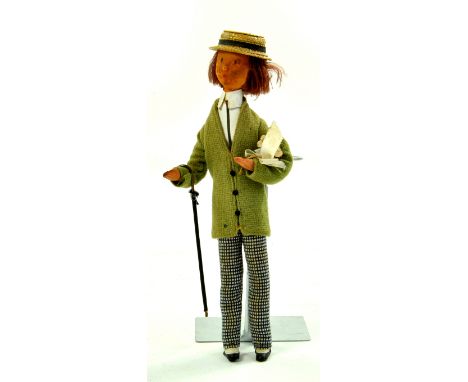 8 ½” Vintage Erna Meyer doll type foam rubber bendable doll. Wearing white plastic shirt, long green buttoned cardigan and bl