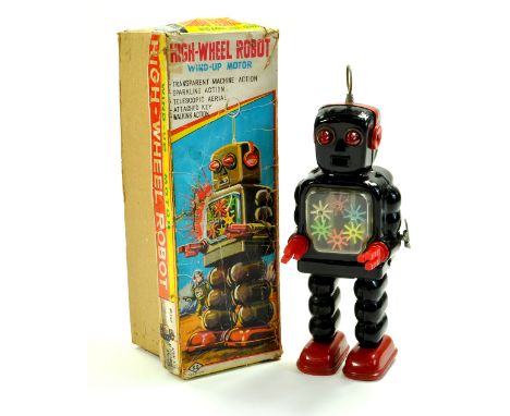 Vintage Yoshiya Japan, 10" Mechanical Operated High-Wheel Robot, with wind-up motor. Working example is generally very good i