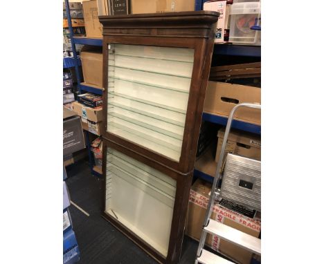 A large vintage wooden glass display cabinet. Supplied by S.A Nobbs, Lincoln. Some wear and tear.